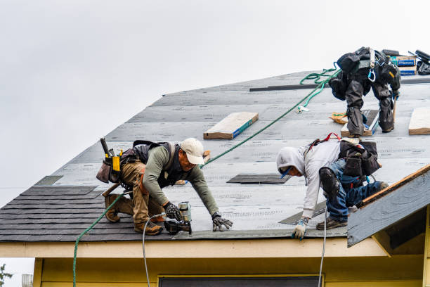 Professional Storm Damage Roof Repair technician working in Rosedale, WA
